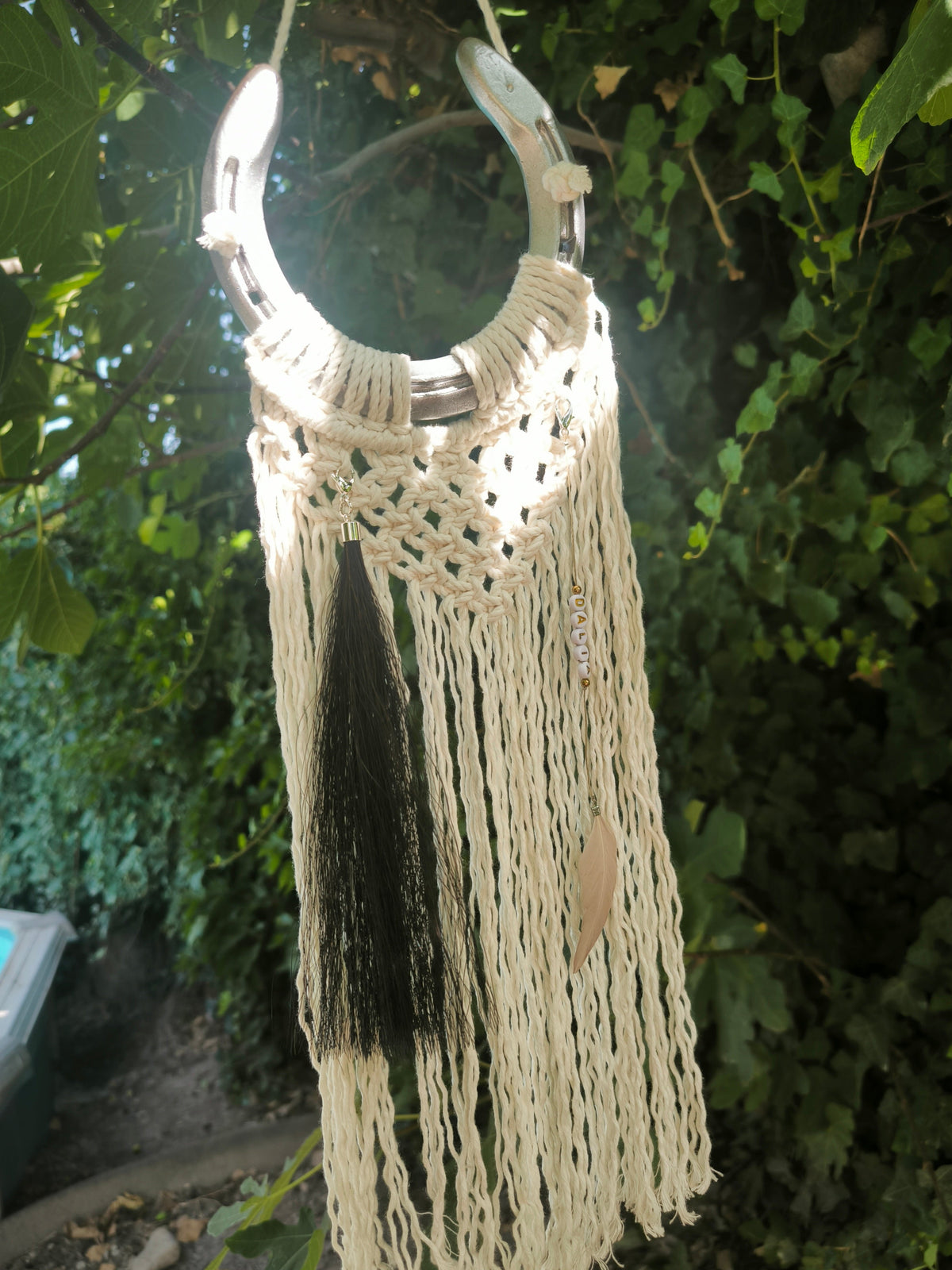Charms souvenir en Crins